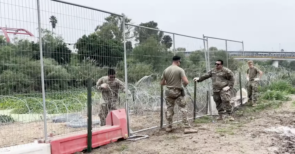 Texas National Guard soldiers install new anti-climb fencing near Brownsville in early December 2023.